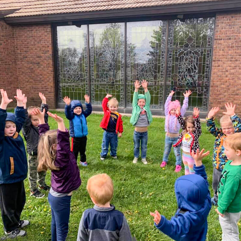 kids-outside-st-mary-catholic-learning-center-daycare-051021-2