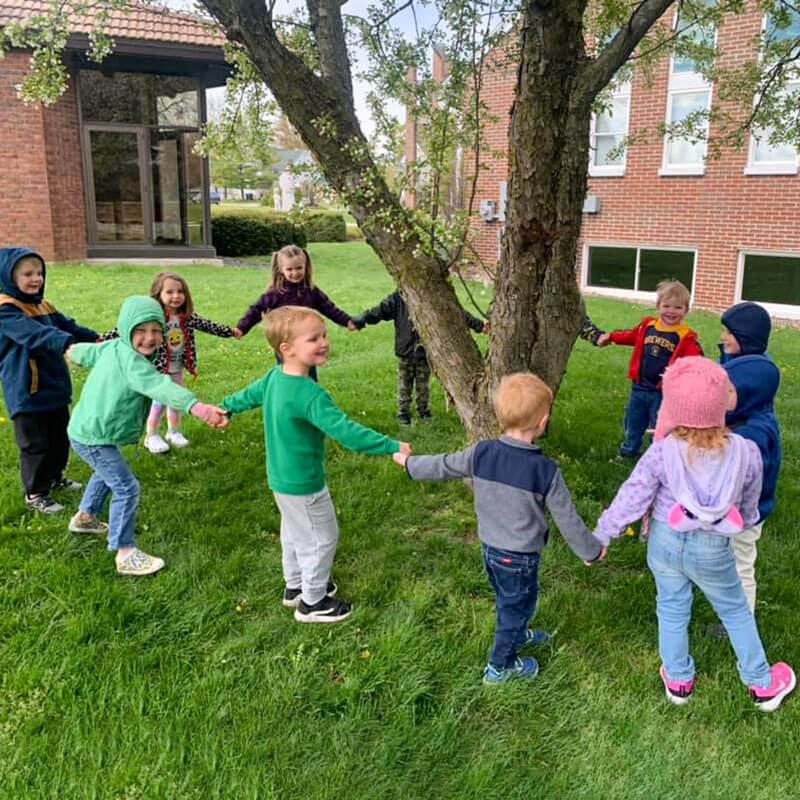 kids-outside-st-mary-catholic-learning-center-daycare-051021